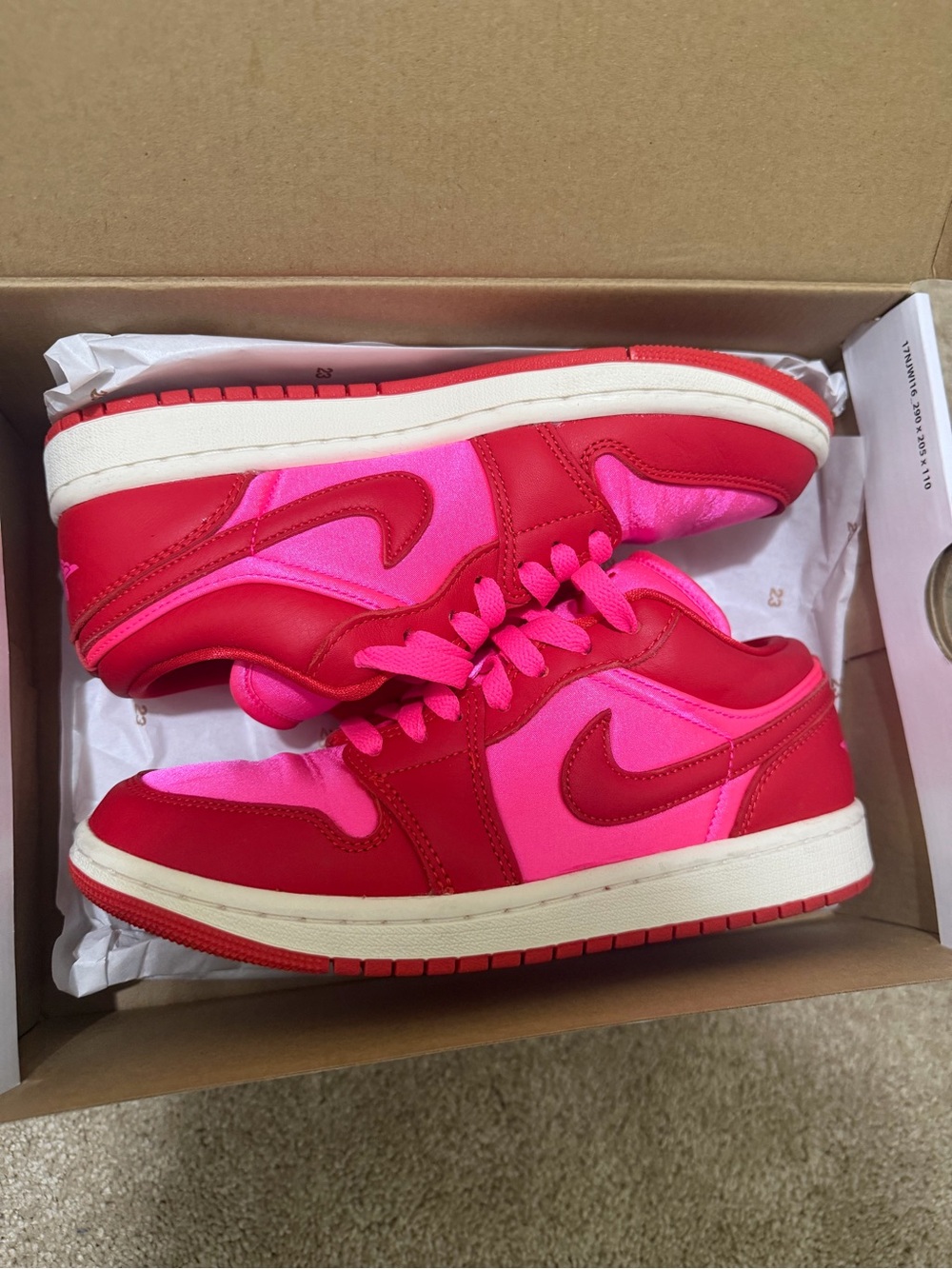 Jordan Women’s Low-Top Sneakers in Red and Pink